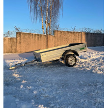 Автомобильный самосвальный оцинкованный прицеп Новатор "PROFI" размер 2.2х1.25м. Борт 315мм