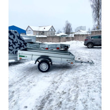 Автомобильный самосвальный оцинкованный прицеп Новатор "PROFI" размер 2.5х1.25м. Борт 315мм