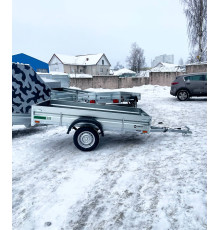Автомобильный самосвальный оцинкованный прицеп Новатор "PROFI" размер 2.5х1.3м. Борт 315мм